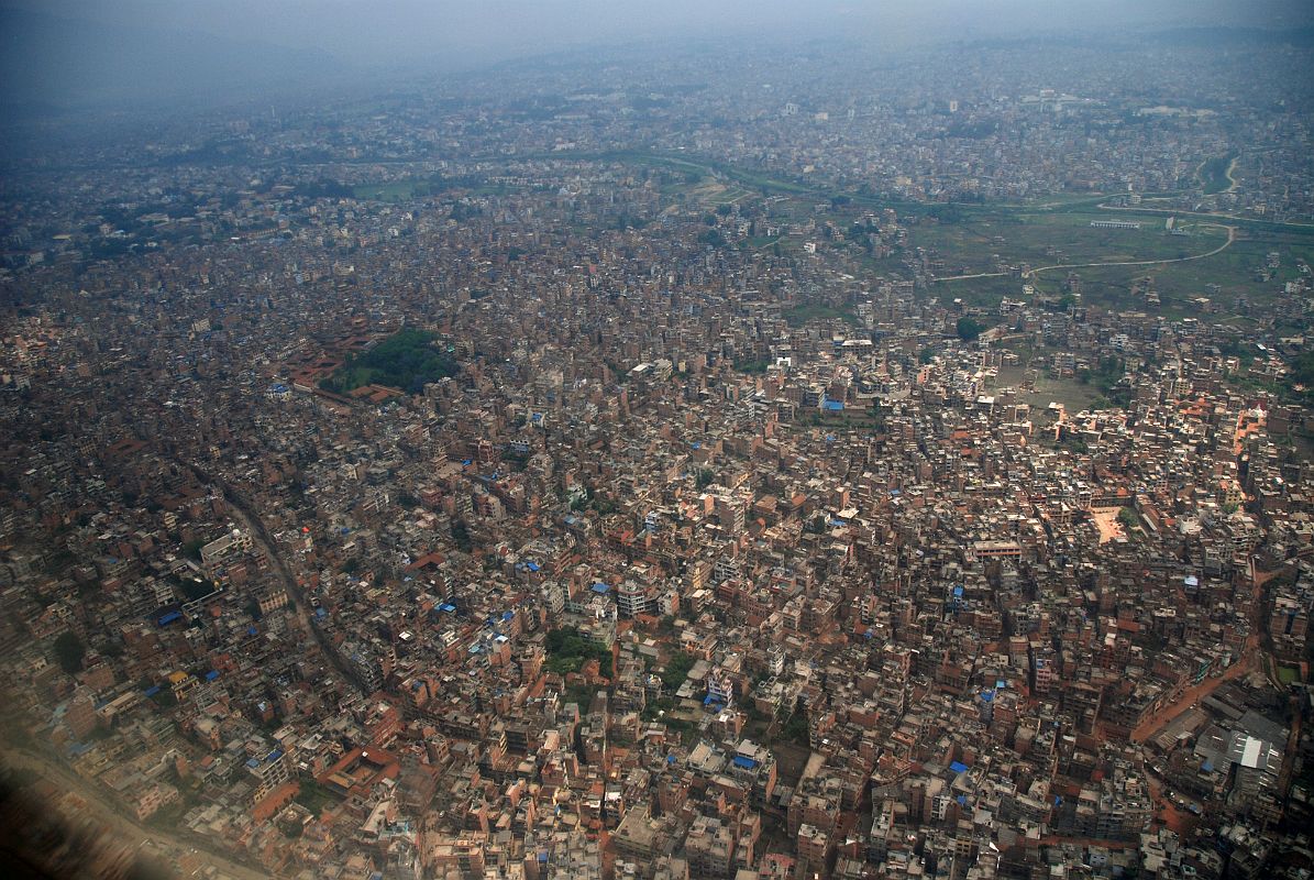 Kathmandu Patan 01 View From Plane Patan (1350m) is the second largest city in the Kathmandu Valley located on the south side of the Bagmati River, 5km southeast of Kathmandu. It is officially known as Lalitpur, the City Of Beauty.